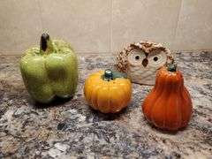 Assorted kitchen items including salt and pepper shakers, cheese grater ...