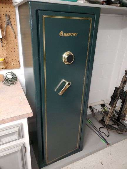 Sentry gun safe 21 in W X 16 in D X 59 in H. Have combination. Located in basement. Heavy item. Bring adequate help.
