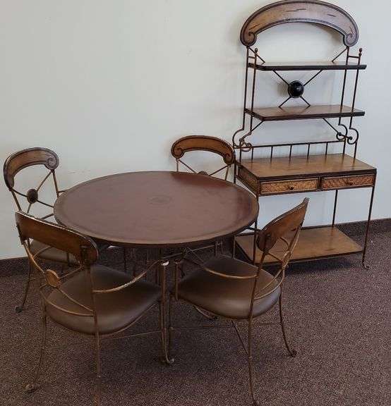 Dinette set by Bassett Furniture includes 42-in round dining table with bent metal frame and four matching chairs with padded seats, baker's rack with wicker finish door fronts measures 34 in W x 17 in D 72 in H. All pieces feature a rustic distressed finish.