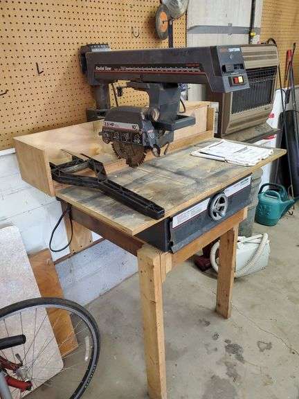 Sears model number 113.197110 in, 2.5 horsepower radial arm saw. Includes original operators manual, extra blades, and wrench also includes wooden stand. The stand will need some slight disassembly to remove from garage. Powers on and works as it should.