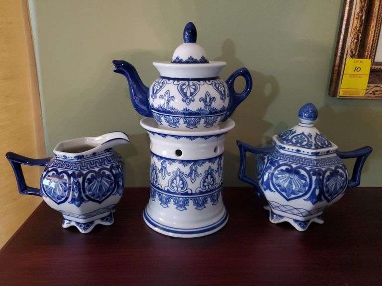 Bombay Company porcelain teapot, creamer and sugar bowl. Living room.