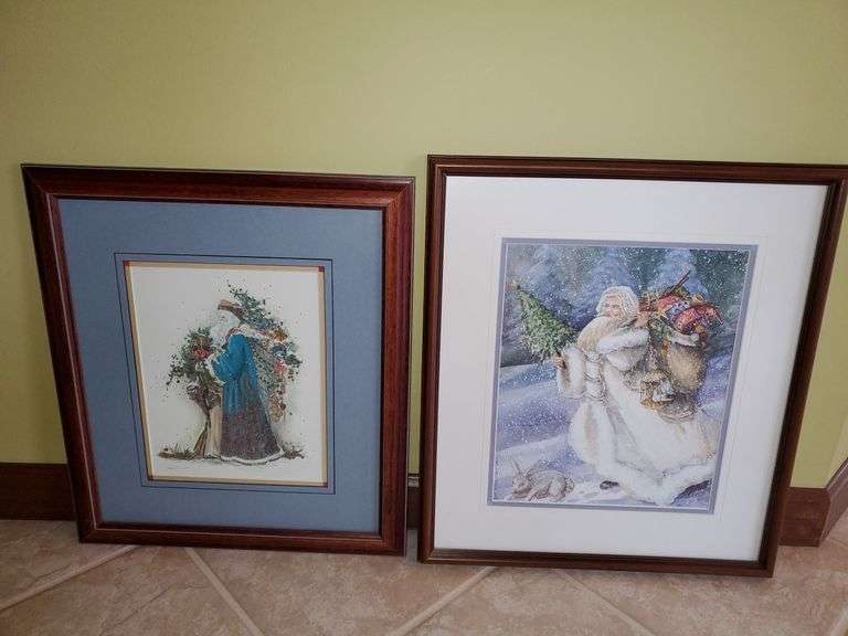 Pair of old world Santa prints measuring approximately 18 in X 16 in. Living room.