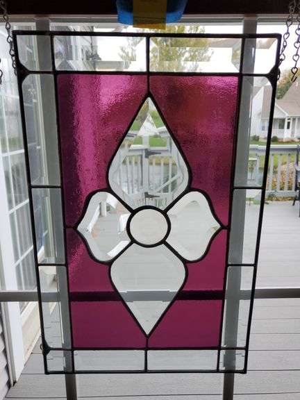 11 in x 17 in suncatcher features bevel edge clear glass and burgundy glass floral design. Living room