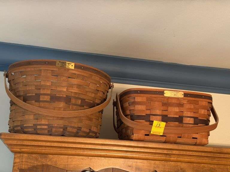 2 Longaberger baskets: JW Collection 1985 edition APPLE BASKET and JW Collection 1992 edition CAKE BASKET. Dining room
