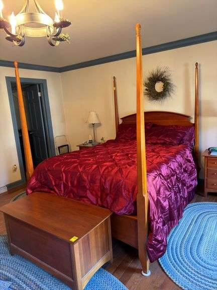 Queen size cherry poster bed with double pillow top mattress, and boxspring. Includes bedding. Master BR.