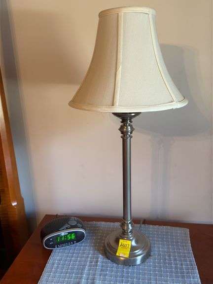 Pair of pewter color candlestick table lamps, 28 inches tall and Jensen radio alarm clock.  Master BR