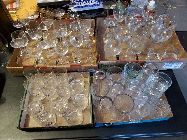 Barware glasses including red and white wine stems, shot glasses highball glasses, and more.