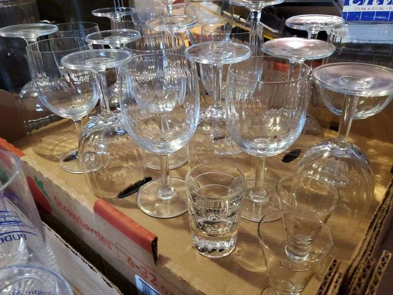 Barware glasses including red and white wine stems, shot glasses highball glasses, and more.
