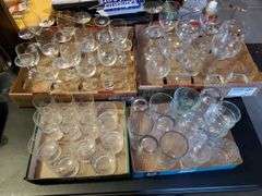 Barware glasses including red and white wine stems, shot glasses highball glasses, and more.