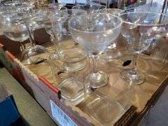 Barware glasses including red and white wine stems, shot glasses highball glasses, and more.