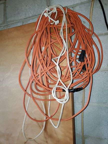 Outdoor extension cord, braided clothesline. Basement rec room. - Bid ...