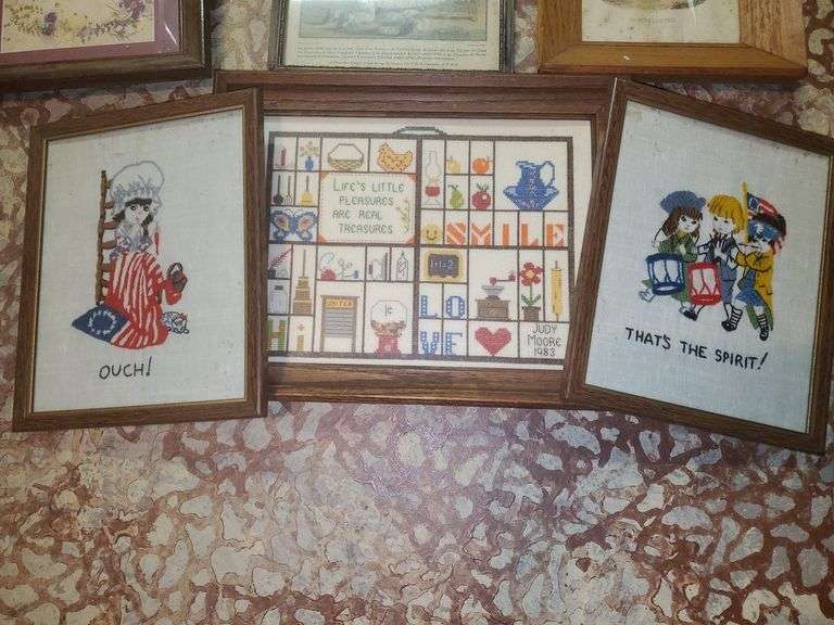 Three cross stitch works featuring Betsy Ross, shadowbox, Fife and drum corps. Also includes framed Norman Rockwell piece inspirational pieces and Victorian style artworks. Sizes range from 12 inch by 15 in down to eight and a half by 11 in. Base