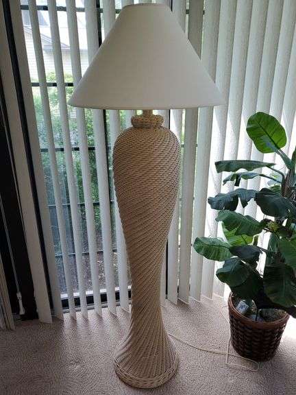 62-in tall wicker floor lamp with fabric shade. Sunroom