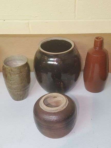 Brown salt glazed pot, stoneware containers. Basement