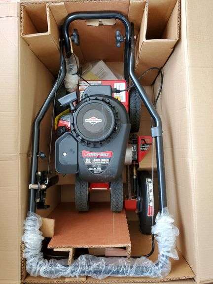 Troy-Bilt model number 25B-554E011, 158cc 4 cylinder Briggs & Stratton 500 series landscape edger with 9-in tri index blade. New in box.