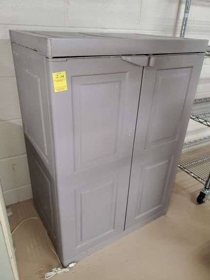Gray composite storage cabinet measures 26 in WX 18 in DX 36 in H. Contents includes shop towels. Basement