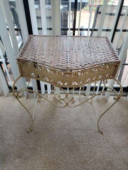 Wicker top and wrought iron framed plant stand with tropical runner measures 26 in WX 29 in H. Sunroom.