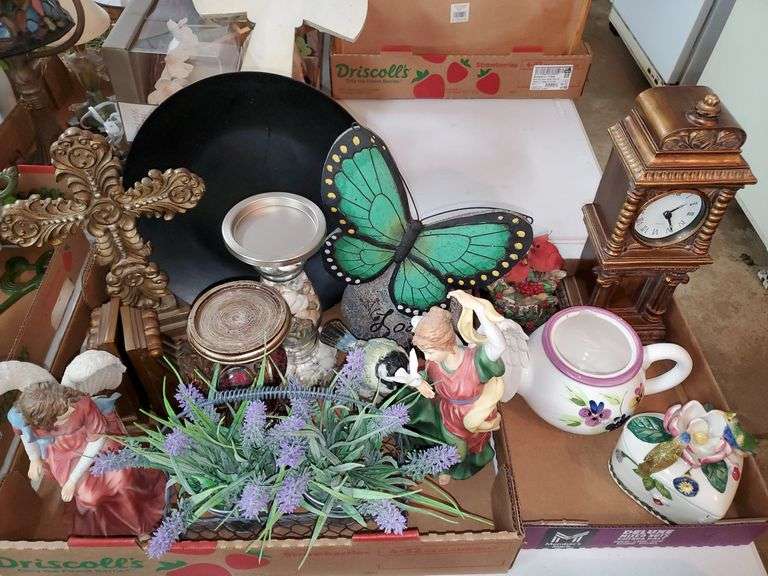 (2) box lot including (2) ceramic angel figurines, pillar candle holders, decorative crucifix, butterfly love stone, quartz mantle clock, ceramic teapot and heart-shaped trinket box. Garage