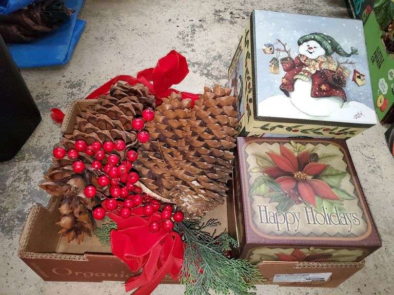 Holiday boxes, festive pine cones. Garage