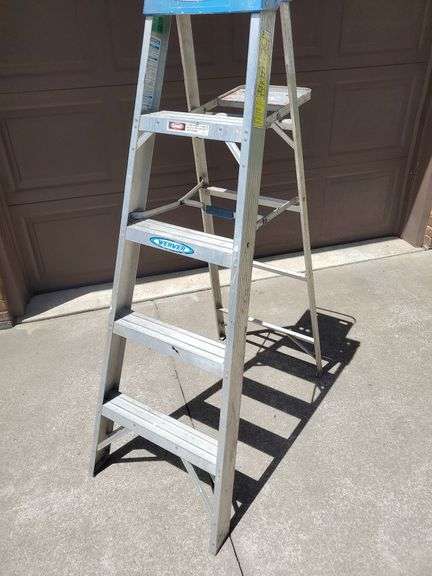 SELLER REMOVED FROM AUCTION! Werner 5 ft aluminum folding ladder. Garage