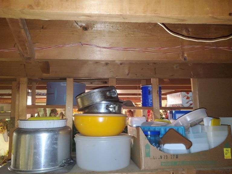 CorningWare tart dish, springform pans, stock pot (missing lid), Tupperware and other storage containers. Basement.
