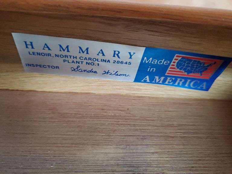 Hammery drop leaf Queen Anne style end table measures 19 in WX 28 in DX 26 in H and features single drawer. Hamry Chippendale style nightstand with four drawers. No contents stand only. Measures 24 in WX 15 in DX 24 in H. No contents. Stand only Living room.