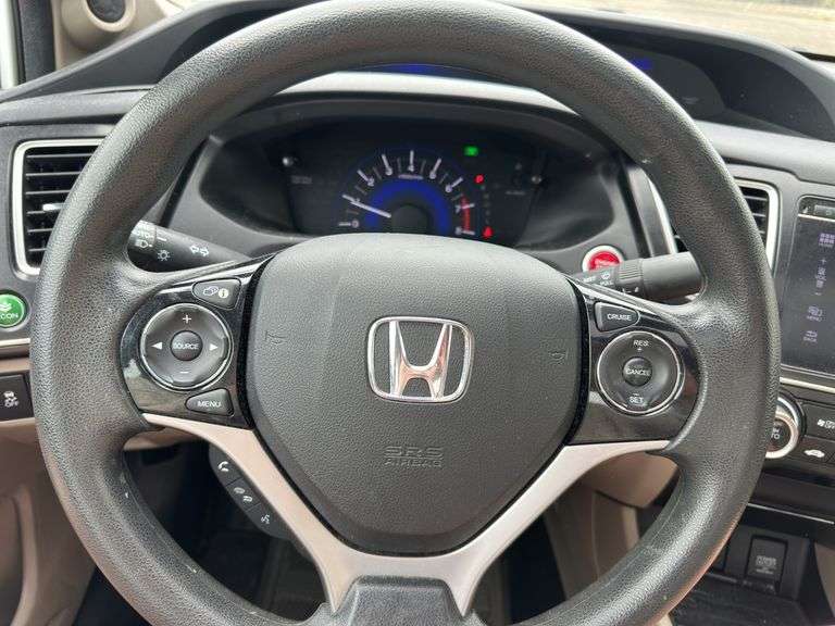 2015 Honda Civic, tan cloth interior, 59k miles, sunroof, power windows and locks. Runs and drives as it should. Sellers just had car serviced with lube oil, filter and inspection.  See Report photos. Payment in full by certified check payable to Basinger Auction Service at time of pickup on days noted.