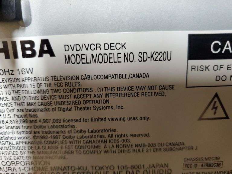 MCS AM FM stereo component with speakers model number 3236, powers on, Toshiba VHS / DVD player model number SD-K220U, powers on, HP keyboard. Basement