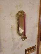 (2) mirrored brass candle sconces, 1 minerature wall shelf with figurine, and framed and matted floral art works by Laurel Lehman 20 in square. All for your bid! Master bathroom