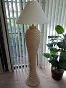 62-in tall wicker floor lamp with fabric shade. Sunroom