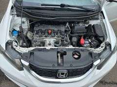 2015 Honda Civic, tan cloth interior, 59k miles, sunroof, power windows and locks. Runs and drives as it should. Sellers just had car serviced with lube oil, filter and inspection.  See Report photos. Payment in full by certified check payable to Basinger Auction Service at time of pickup on days noted.
