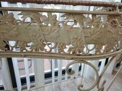 Wicker top and wrought iron framed plant stand with tropical runner measures 26 in WX 29 in H. Sunroom.