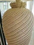 62-in tall wicker floor lamp with fabric shade. Sunroom