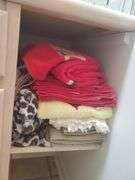 Bath Towels, Hand Towels, Wire Organizer Stand with contents, Ceramic Wall art, and Crestor Wall Clock