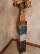 Decorative French print artwork measure 12 in by 16 in, toe metallic vase planter. Dining room.