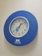 Bath Towels, Hand Towels, Wire Organizer Stand with contents, Ceramic Wall art, and Crestor Wall Clock