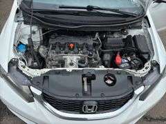 2015 Honda Civic, tan cloth interior, 59k miles, sunroof, power windows and locks. Runs and drives as it should. Sellers just had car serviced with lube oil, filter and inspection.  See Report photos. Payment in full by certified check payable to Basinger Auction Service at time of pickup on days noted.