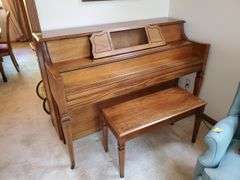 Vintage Everett piano with wood case designed by William g Faber. Measures 60 in wx 25 in DX 41 in H and includes lift top. living room