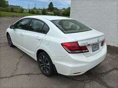 2015 Honda Civic, tan cloth interior, 59k miles, sunroof, power windows and locks. Runs and drives as it should. Sellers just had car serviced with lube oil, filter and inspection.  See Report photos. Payment in full by certified check payable to Basinger Auction Service at time of pickup on days noted.