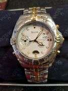 Bulova Millennia White/Yellow gold toned watch with original box. Inspect at preview.