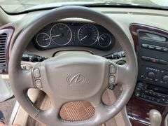 2001 Oldsmobile Aurora 4 dr. sedan, 3.5 L V6 engine, auto trans, full power including power windows, driver side power adjustable seat, beige leather seats, luster white exterior, only 27,572 miles!  See photos!   Runs and drives like new!  Payment in full by cash, certified check, or wire transfer payable to Basinger Auction Service at time of pickup on days noted.
