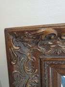Ornate, bevel edged, wall mirror measures 33 in WX 45 in H.. Living room