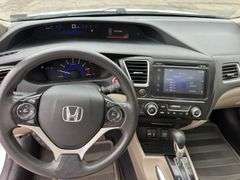 2015 Honda Civic, tan cloth interior, 59k miles, sunroof, power windows and locks. Runs and drives as it should. Sellers just had car serviced with lube oil, filter and inspection.  See Report photos. Payment in full by certified check payable to Basinger Auction Service at time of pickup on days noted.