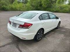 2015 Honda Civic, tan cloth interior, 59k miles, sunroof, power windows and locks. Runs and drives as it should. Sellers just had car serviced with lube oil, filter and inspection.  See Report photos. Payment in full by certified check payable to Basinger Auction Service at time of pickup on days noted.