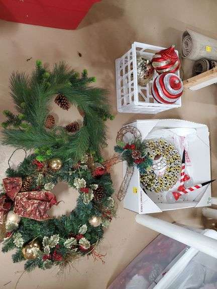 24-in lighted Christmas wreath, two 18-in Christmas wreaths, three large Christmas ornaments. Basement