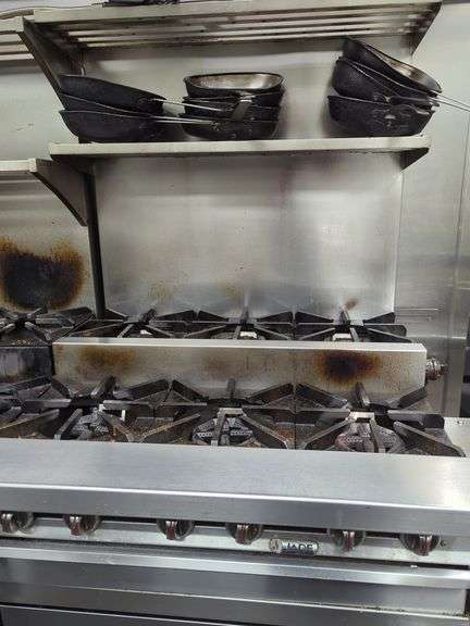 Jade 6 burner gas stove with step up three burner, 36x32 includes 36 in back shelf. Excellent