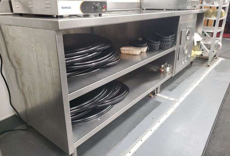 Stainless steel prep table with toastmaster warming drawers105 long x30x d x37h... Still working but knob need replaced ..No other contents or included