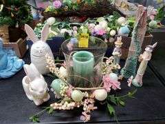 Easter items including ceramic bunny figurines, composite bunny figurines, glass candle centerpiece, Easter candle holders, Easter lights. Basement.