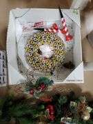 24-in lighted Christmas wreath, two 18-in Christmas wreaths, three large Christmas ornaments. Basement