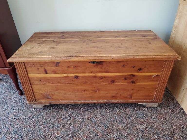 Solid knotty pine blanket chest measures 44 in W x 21 inches D 20 in H.